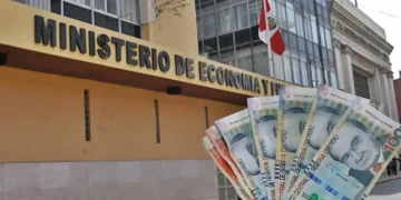 billetes peruanos, detras de ellos uno de los ministerios del gobierno peruano